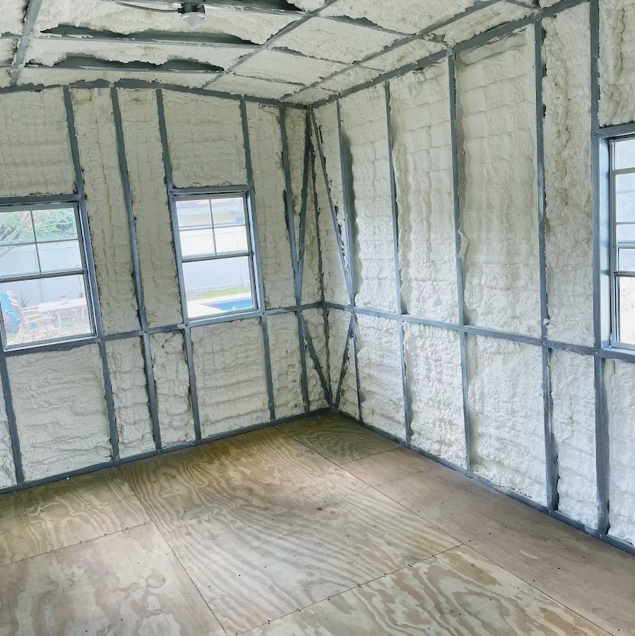 Closed-cell spray foam insulation applied to wall cavities in a residential project in Reedurban